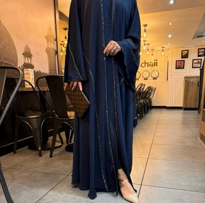 Elegant umbrella-style abaya embellished with matching hijab