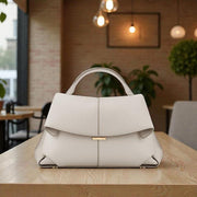 Women's genuine cowhide leather shoulder and crossbody handbag