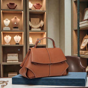 Women's genuine cowhide leather shoulder and crossbody handbag